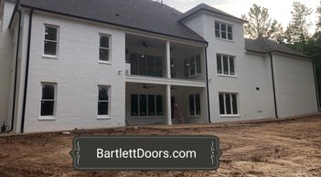 Black gutters to match garage door