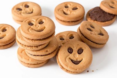 Biscuits with smiley faces.  Customer experience.