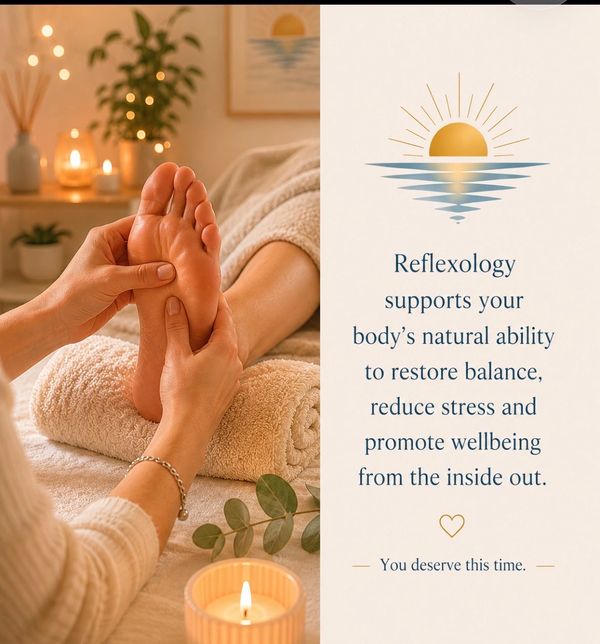 Foot reflexology session in a cozy setting with calming lights.