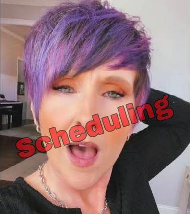 Person with purple hair and open mouth with 'Scheduling' text overlay.
