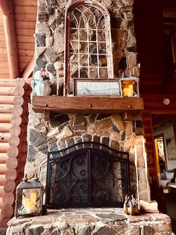 Beautiful vintage french lanterns added to a lovely fireplace setting.   