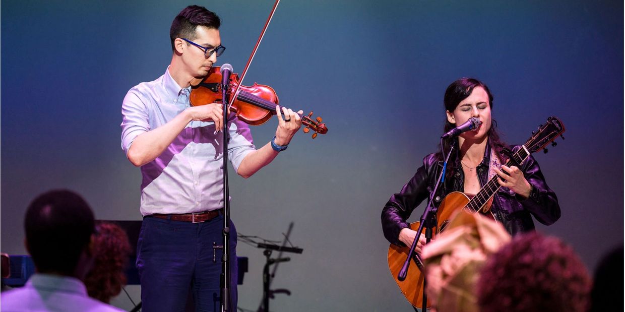 Rings of Maple performing -- image includes a fiddle player and guitarist singing.