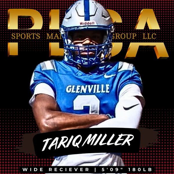 Football player Tariq Miller in a blue Glenville jersey.