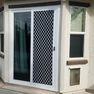 sliding security screen door with pet mesh
sunscreen
dog door
replacement glass
