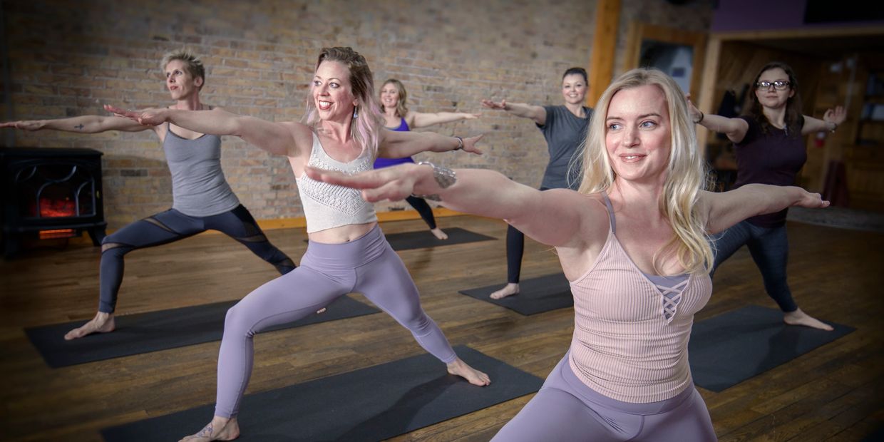 9 Aerial Yoga Poses For Beginners & Beyond: The Amazing Benefits