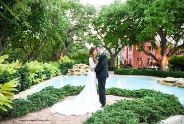 Bride and groom at the pond area. 