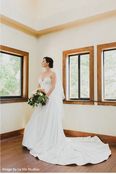 Bride posing in the Bridal Suite. 