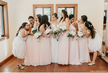 Bride and bridesmaids in the bridal suite. 