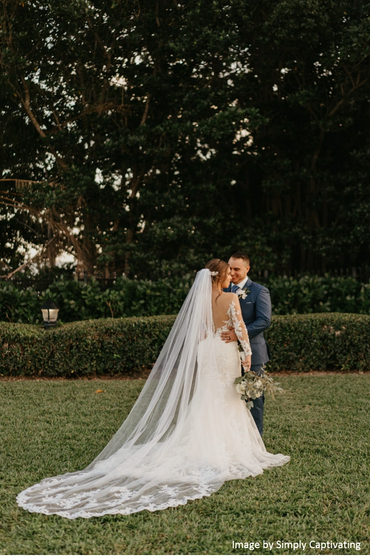 Bride and groom at the garden lawn. 