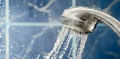 Shower using energy efficient heat pump hot water heaters 