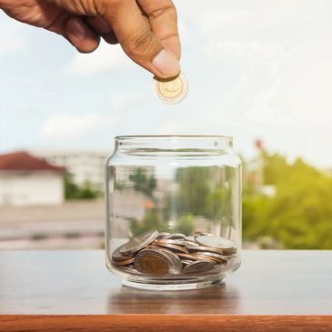 saving coins in a mason jar