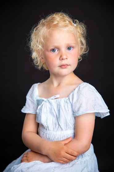 Child portrait of a young girl in studio located in Cold Lake Alberta