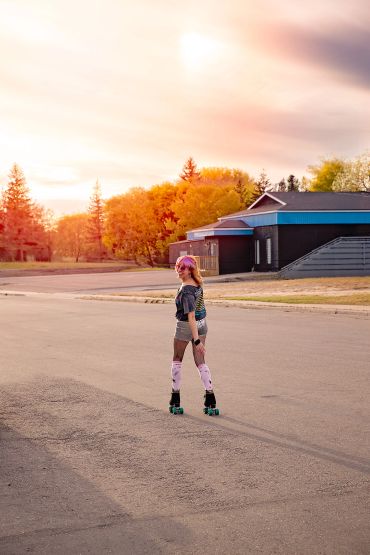 Roller Haus owner roller skating at the Marina in Cold Lake Alberta.