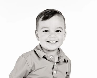 Black and white portrait of a toddler in studio located in Cold Lake Alberta.