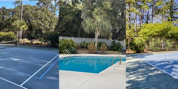Community Tennis and pickleball courts next to a private pool surrounded by trees