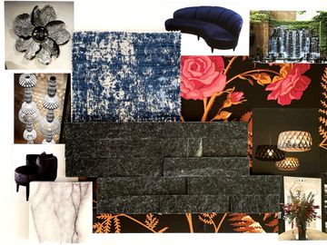 Charcoal waterfall tile, deep blue curved sofa, hanging lights, silver flower, textured fabric.