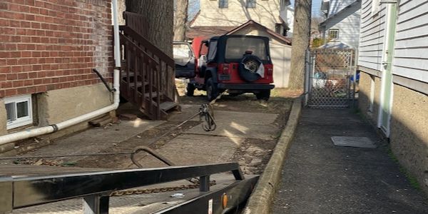 Junk Car Removal with flat bed truck