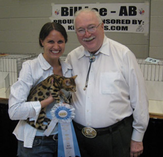 At Tica cat show winning with my boy