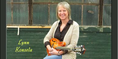 Lynn Konsela a great harmony singer and mandolin player