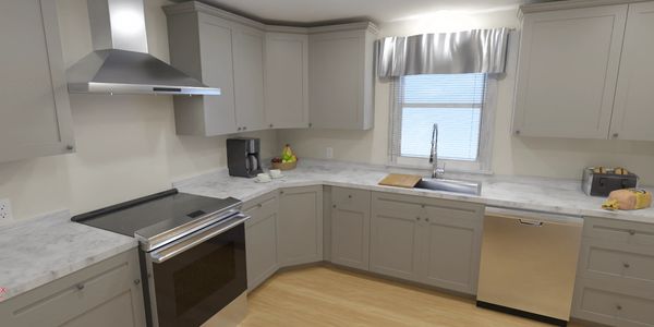 Grey Shaker 10x10 Kitchen Cabinets by Crafted Spaces Design Build Design Center