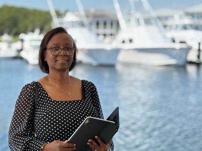 Wedding officiant in West Palm Beach performing a ceremony on a boat at the dock