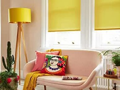 Bright coloured Roller blinds in a lounge