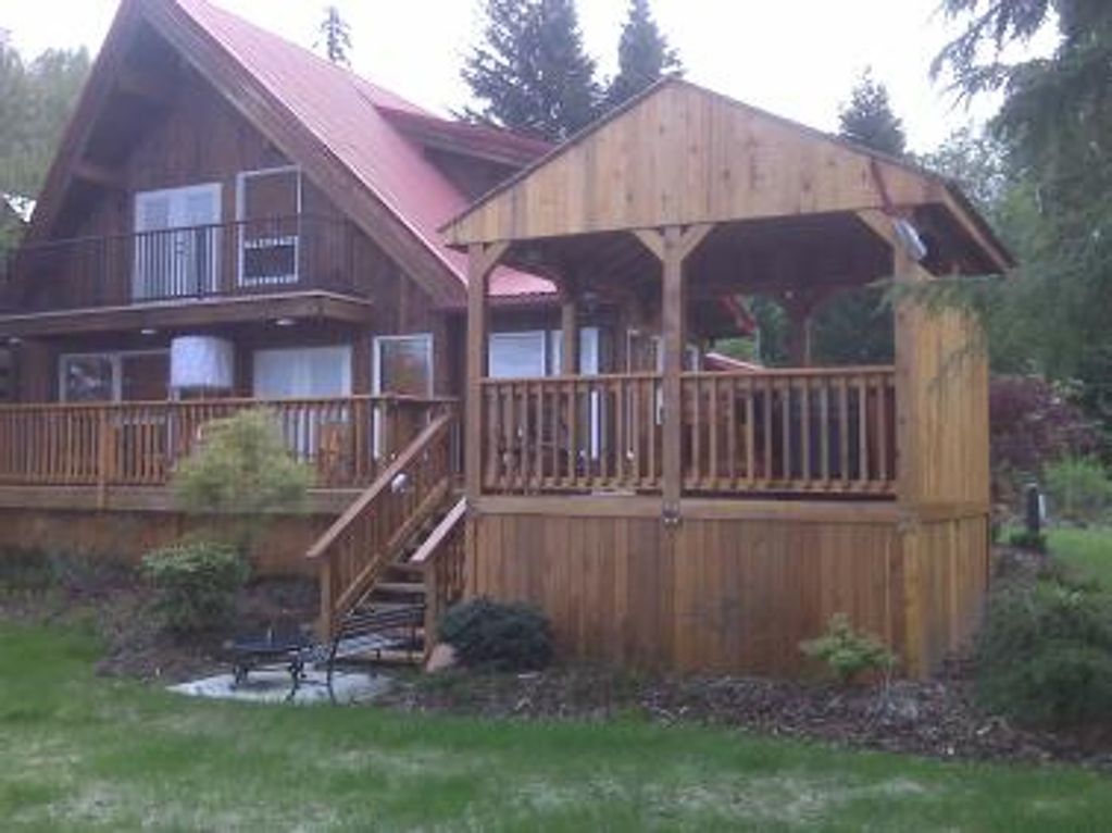 Cedar Deck with Lighting, Hot Tub  Shelter and privacy skirting.