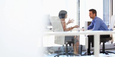 a manager having a conversation with a team-member