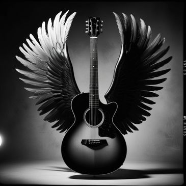 Black acoustic guitar with large angel wings in black and white.