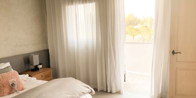 Master bedroom with walkout balcony.