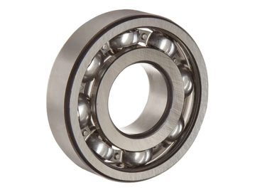 Close-up of a metal ball bearing with visible steel balls.