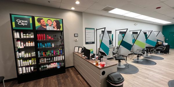 Interior of a Great Clips hair salon with styling stations and product shelves.