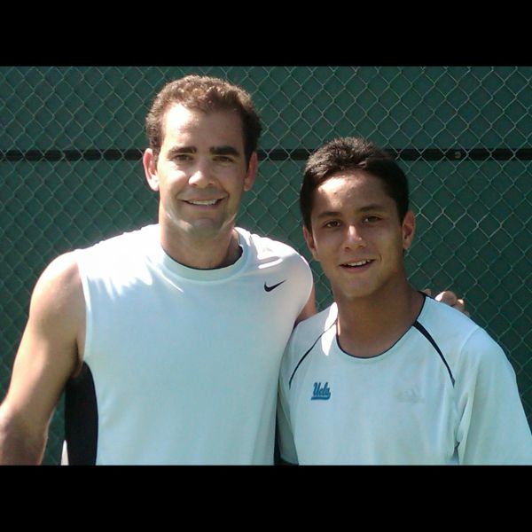 Maxime Tabatruong with Pete Sampras during his professional tennis career.