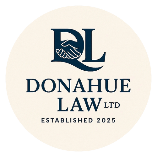 Stack of books next to pencils in a holder and a camera.