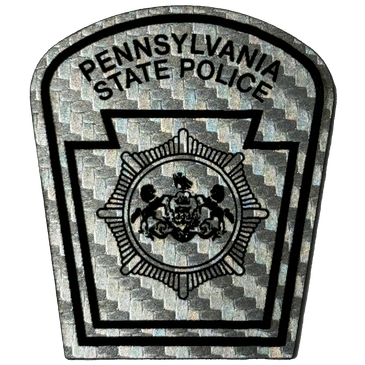 Patch of Pennsylvania State Police with emblem and text.