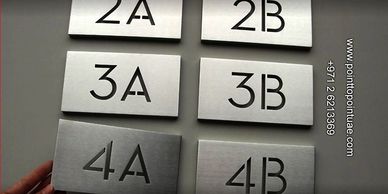 steel engraving company in uae, pen engraving, brass engraving, labels suppliers, safety labels.