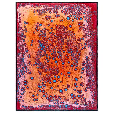Abstract artwork with vibrant red, orange, and blue circular patterns.