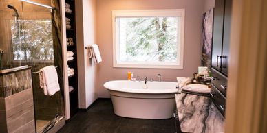 Modern bathroom renovation with walk-in tile shower completed by Complete Renovations by Corbo
