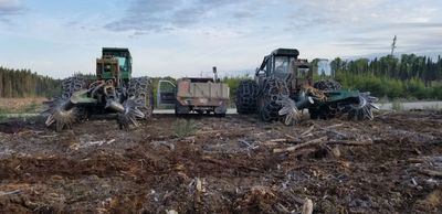 John Deere skidders with Donaren hydraulic disc trenchers ready for forestry site preparation