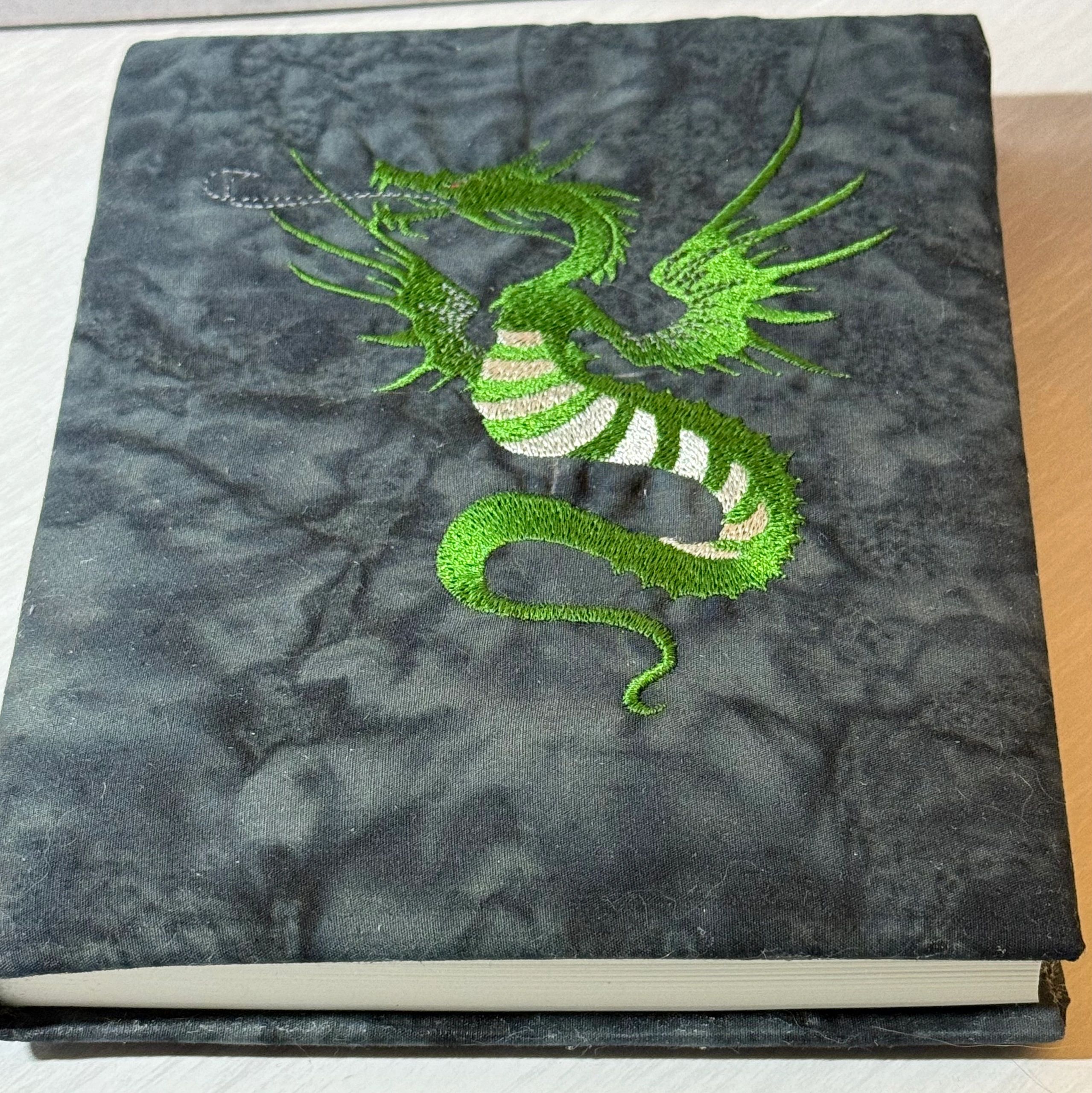 Custom embroidered dragon grimoire