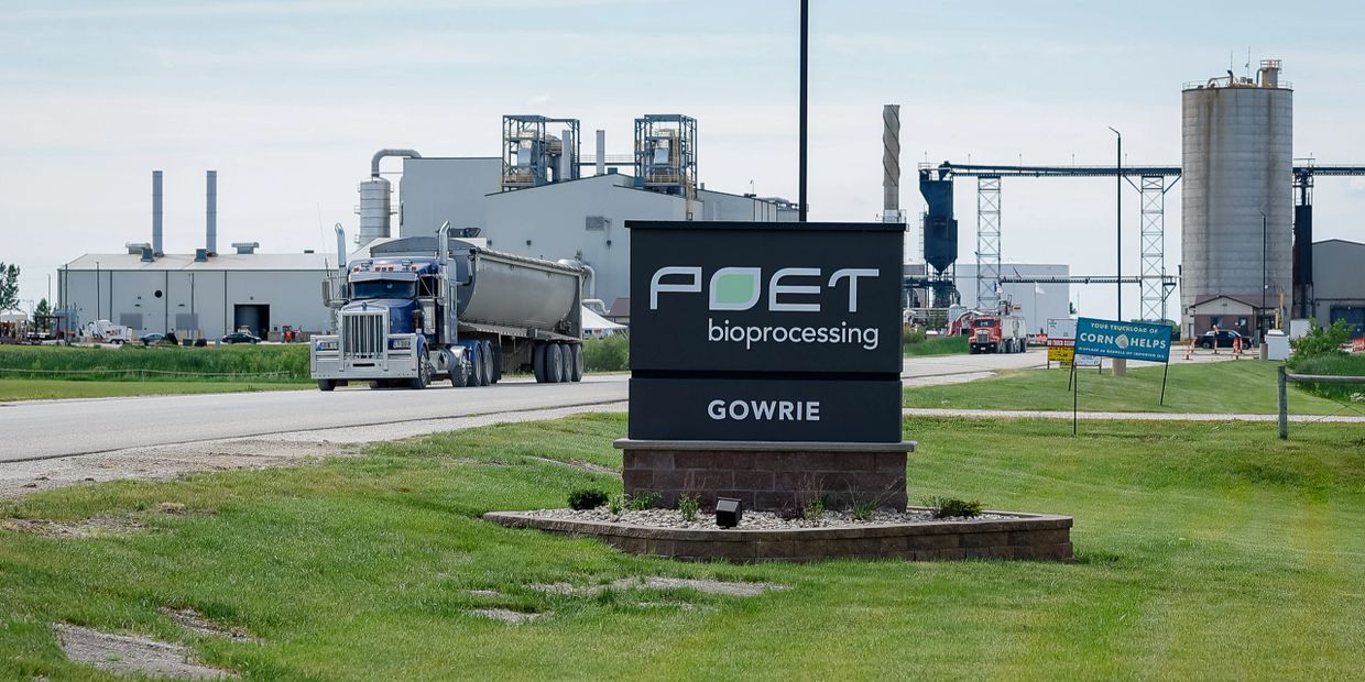 POET bioprocessing facility with a truck and industrial buildings.