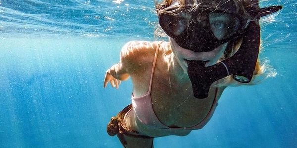 girl snorkeling