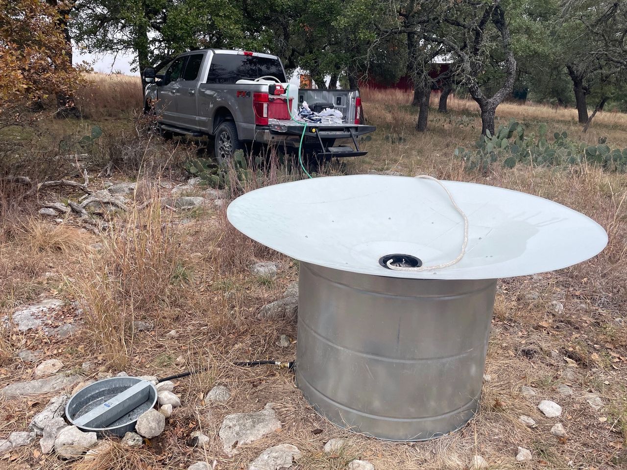 A rainwater catchment system is installed providing supplemental water for wildlife species and management. 