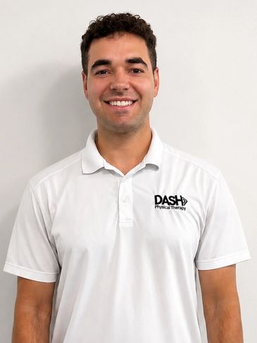 Smiling man in a white DASH Physical Therapy polo.