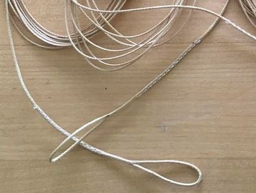 Unsheathed paraglider lines