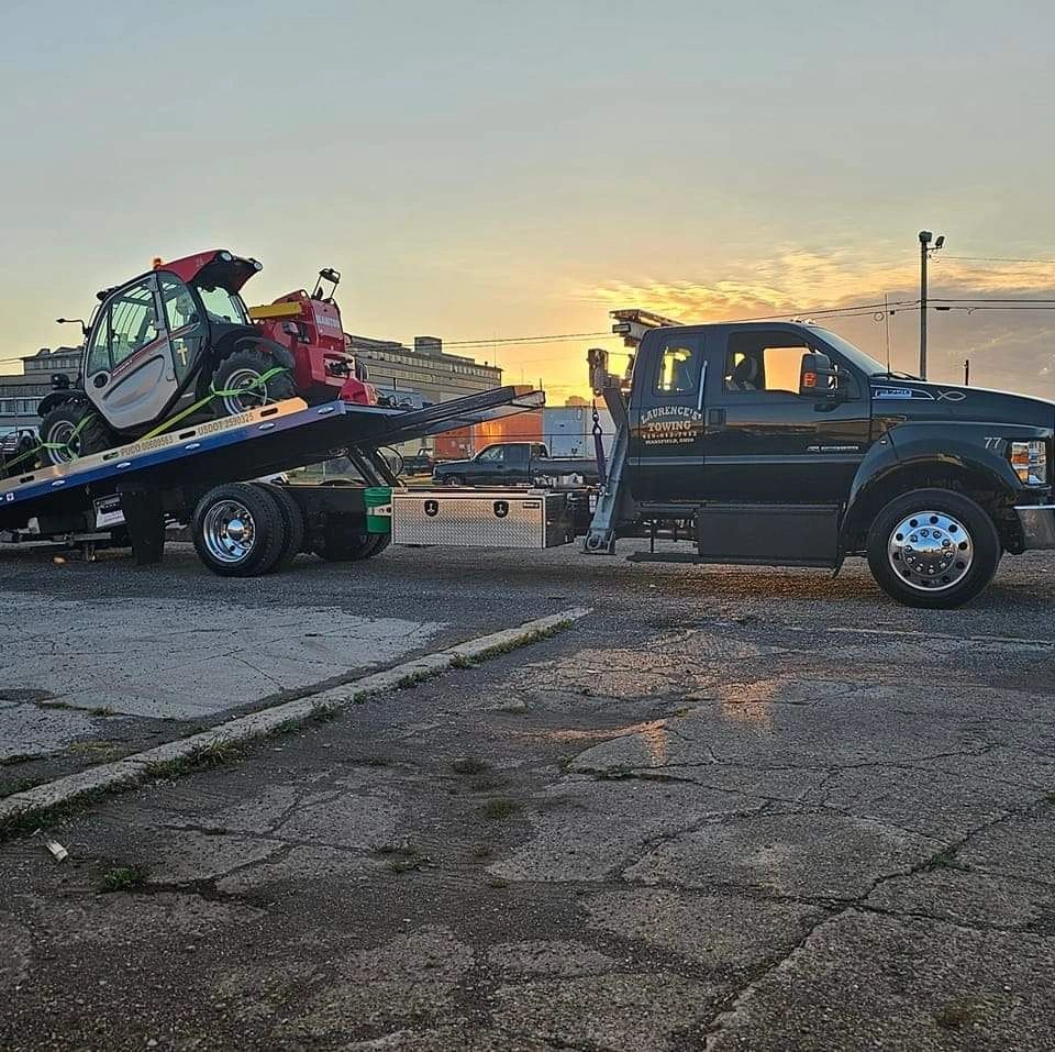 Laurence's Towing LLC logo