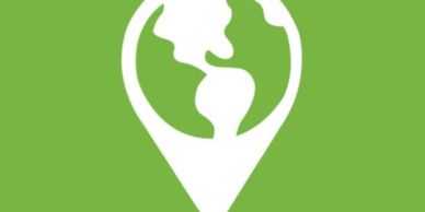 White location pin with Earth continents on green background.