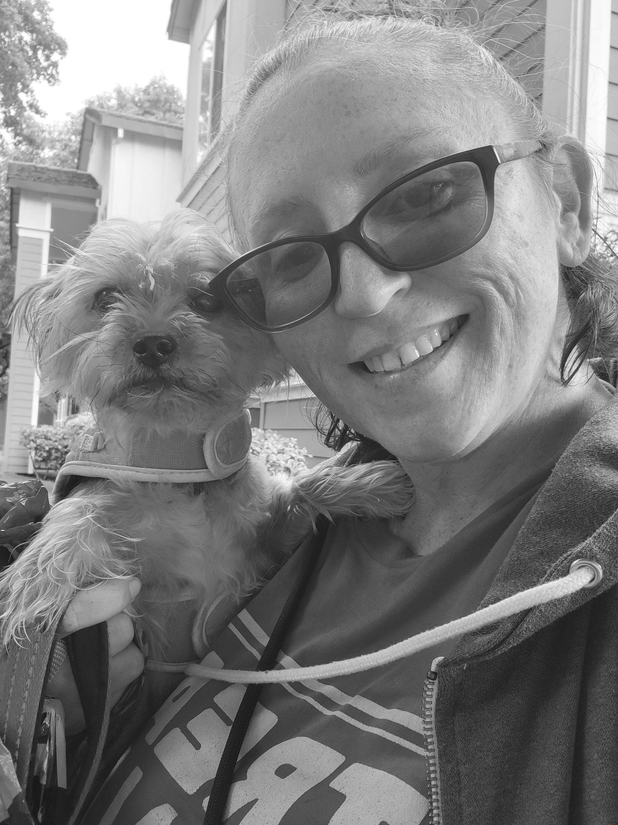 Sara, pet sitter, with small dog client