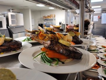 Catering event  with many plated dishes