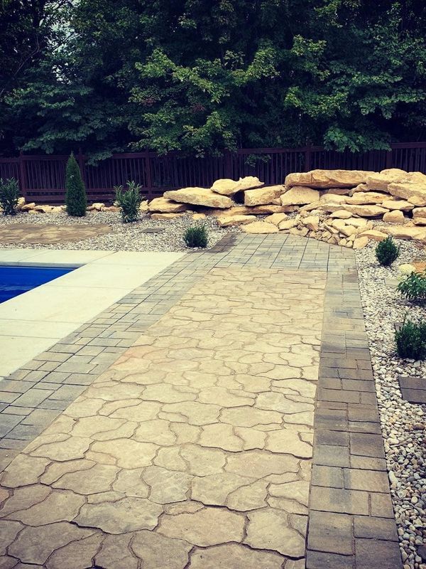 Custom detailed pavers, Limestone Rock, Beautifully designed landscape all designed by J.Earp Landsc